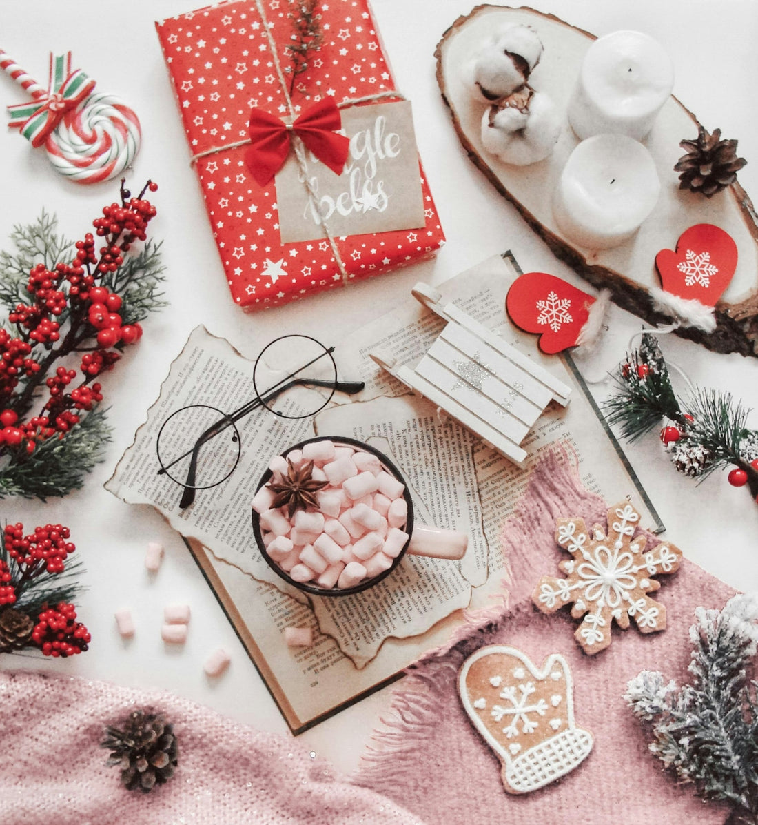 Cozy christmas flat lay with gifts and treats.